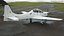 Compact Military Attack Plane with External Fuel Tanks White model