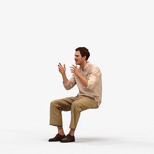 00562Jason013 - Adult Caucasian male talking while sitting in office wearing transitional clothing