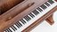 Pianoforte verticale in legno scuro