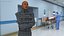 Asian Man Patient in Straitjacket