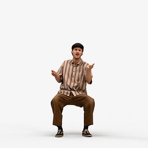 00554Jason002 - Adult Caucasian man talking while sitting at home in autumn attire