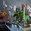 Cenário de mesa com rosas e toranjas