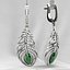Boucles d'oreilles en or sertie de pierres précieuses en forme de plume de marquise de 8 mm