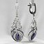 Boucles d'oreilles en or sertie de pierres précieuses en forme de plume de marquise de 8 mm