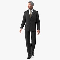 Senior Chinese Businessman Walking