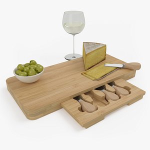 High-quality composition of bamboo cheese board with cheese olives and a glass of wine