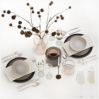 table setting for 2 persons with a bouquet of dried flowers