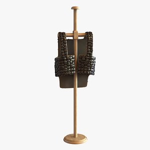 Old scale body armor on wood hanger