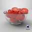 Moitiés de tomates cerises dans un bol en verre