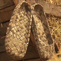 Hanging Worn Bast Shoes
