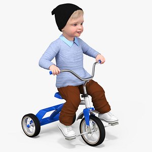 One Year Old Toddler on a Tricycle