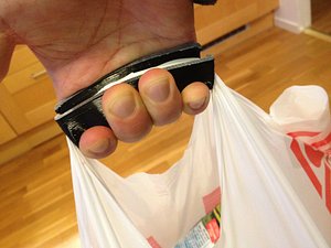 Flexible Plastic Bag Handle with "coins"