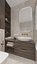 Hermoso baño con azulejos de mármol.
