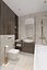 Hermoso baño con azulejos de mármol.