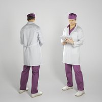 Male doctor reading patient history 277