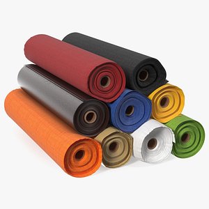 Pile of Differently Colored Fabric Rolls