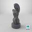 Torso femminile scolpito nella pietra