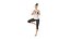 Women Doing Yoga in Tree Pose