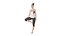 Women Doing Yoga in Tree Pose