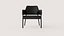 Sillón moderno tapizado en color oscuro con estructura metálica delgada.