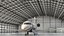 Business Jet Bombardier Challenger 604 in un hangar per aerei attrezzato