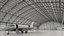 Business Jet Bombardier Challenger 604 in un hangar per aerei attrezzato