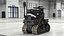 Ancien système robotique multifonctionnel noir truqué