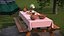 Rustic Picnic Table with Food and Pottery Served