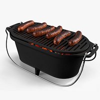 Charcoal Grill with Sausages Over Fire