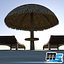 sunbeds and bamboo umbrella