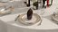 Dinner Plate Setting with Folded Napkin Brown