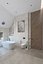 Spacious bathroom with stone tiles