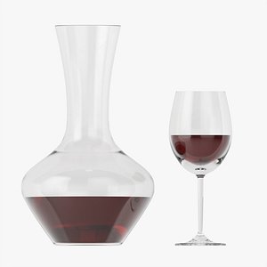 Decanter with wine and glass