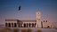 Falcon animated flying in Traditional heritage building desert
