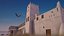 Falcon animated flying in Traditional heritage building desert