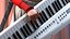 Dark Skin Woman with Roland AX Edge Keytar Rigged for Modo