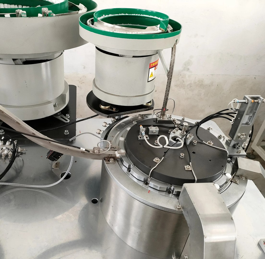 Perfume  Freshener Spray Nozzle Assembly Machine - Automated Nozzle Fitting System 3D CAD Model model https://p.turbosquid.com/ts-thumb/dK/PIQ8xO/jO/02/jpg/1766144023/1920x1080/fit_q87/0a6f977dd8ff69cc98aa606ca588f48c2e121f11/02.jpg