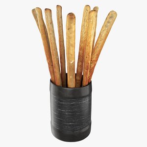 Crispy bread sticks in cup