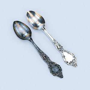 Photorealistic vintage silver and iron spoons
