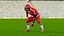 Black Man American Football Player Crouching Red Uniform