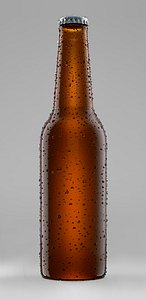 Beer bottle with water drops