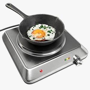 Iron skillet with egg on a single hotplate hob model