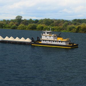 Tugboat Transported Hopper Barge with Sand on Water