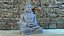 Statua di pietra del Buddha in meditazione