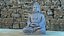 Statua di pietra del Buddha in meditazione