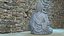 Statua di pietra del Buddha in meditazione