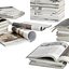 Conjunto de pilhas de revistas abertas