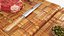 Ribeye Steak with Green Peppercorns on Cutting Board