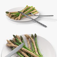 Cooked Asparagus Plate with Steel Fork and Knife