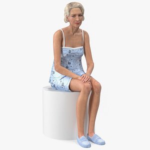 Elderly Woman in Sleepwear Siting Pose